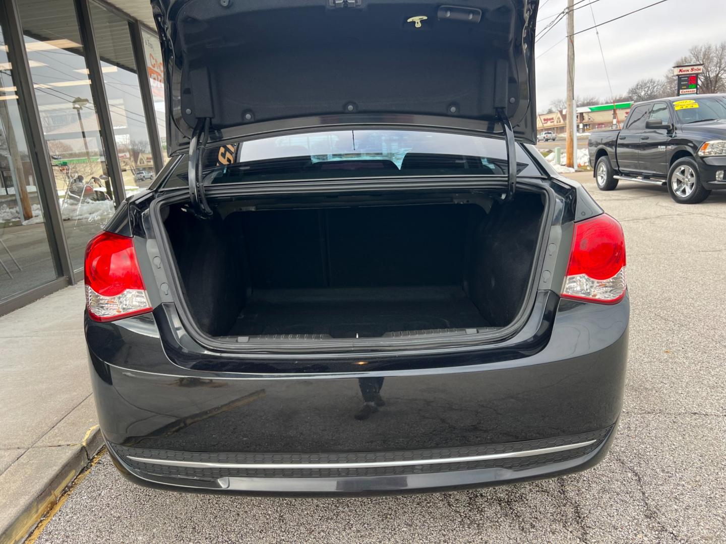 2014 Black Chevrolet Cruze LS Auto (1G1PA5SH5E7) with an 1.8L L4 DOHC 16V FFV engine, 6-Speed Automatic transmission, located at 1633 W Kimberly, Davenport, IA, 52806, (563) 323-5341, 41.559456, -90.598732 - Photo#4